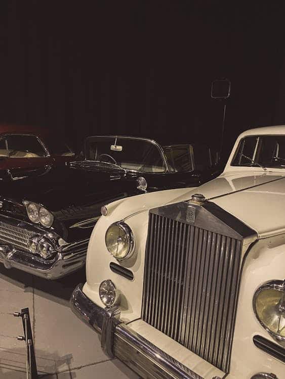 Vintage luxury cars displayed in Ahmedabad, reflecting timeless elegance and a romantic heritage experience