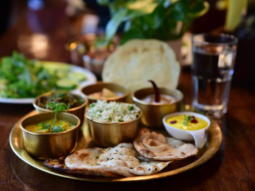Authentic Gujarati thali served at a traditional restaurant in Ahmedabad.